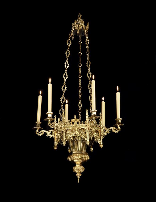 A six light gothic brass chandelier | MasterArt